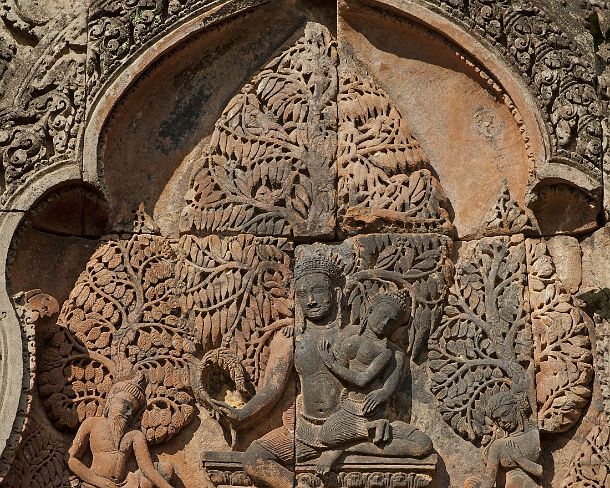 sm_banteisreigN1407 Shiva and Uma sitting on the summit of Mount Kailashi while the demon Ravana is shaking the mountain, part of the bas-relief of the east facing pediment of the...