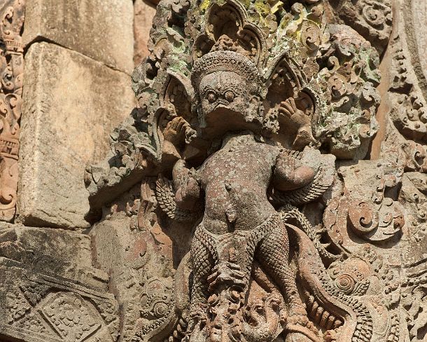 sm_banteisreigN1415 Mythological figure appearing as Garuda guaring the inner sanctuary, Banteay Srei temple, Citadel of the Women, Angkor, Cambodia fierce-looking beast guards the...