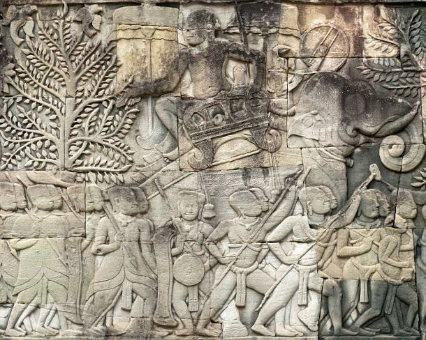 sm_bayonN1424 Stone carving depicting scenes from a military procession of the army of Jayavarman VII, the commanders of the troops are mounted on elephants, Bas-relief of...