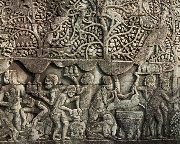 sm_bayonN1428 Bas-relief carved in stone depicting genre scenes of daily life along the shores of Tonle Sap, this panel shows cooks preparing food and drinks for the king who...