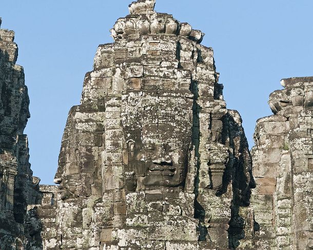 sm_bayonN1431 View of one of more than 50 mystical stone face towers of Bayon temple, Angkor Thom, Siem Reap, Cambodia