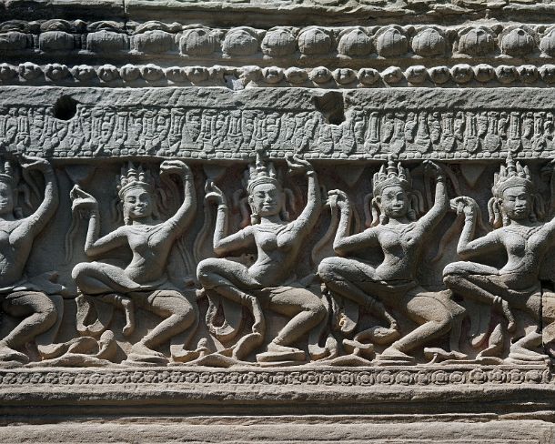 smpreakhanN1456 Carved sandstone lintel depicting apsaras, celstial dancers, at the of Hall of Dancers, Preah Khan temple, built by King Jayavarman VII in 12th century, Angkor,...