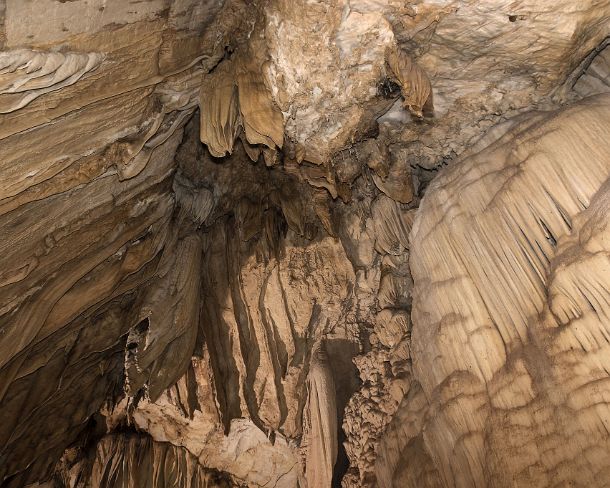 sm_deercave_0007 Amazingly shaped calcite deposits (speleothems) created by drippling water at the cave wall, Lang Cave, Gunung Mulu National Park, Sarawak, Borneo, Malaysia