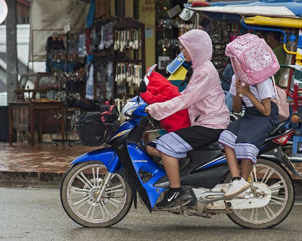 smLuangPN1501 Riding in the rain, Luang Prabang, Laos