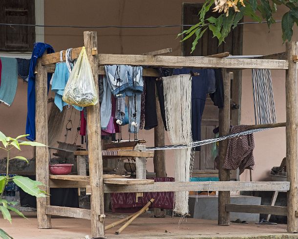 smLuangPN1511 Traditional Lao-Thai style loom outside of a family house, Ban Phanom, Laos