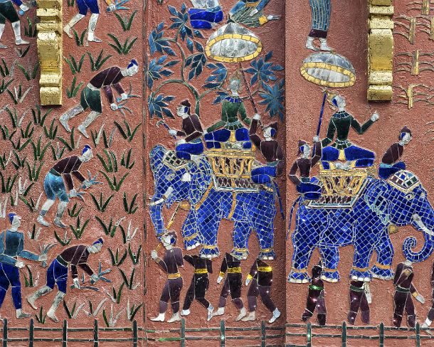 smLuangPtemplesN1572 Brightly colored mosaic inlays illustrating scenes of rural life at an external wall of the Tripitaka Library, Temple Wat Xieng Thong, Luang Prabang, Laos