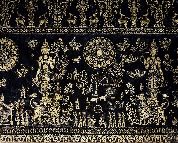 smLuangPtemplesN1580 Exterior wall decorated with intricate gold stenciled deities, mythological animals, scenes from the Jataka tales and floral motifs, Sim (Congregation Hall),...