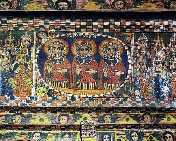 Wooden Panel of the narthex depicting the Trinity in the center and at either side the twenty-four Elders of the Apocalypse, painting on wood, orthodox church Abreha wa Atsbaha, Gheralta region, Tigray, Ethiopia Wooden Panel of the narthex depicting the Trinity in the center and at either side the twenty-four Elders of the Apocalypse, painting on wood, orthodox church...