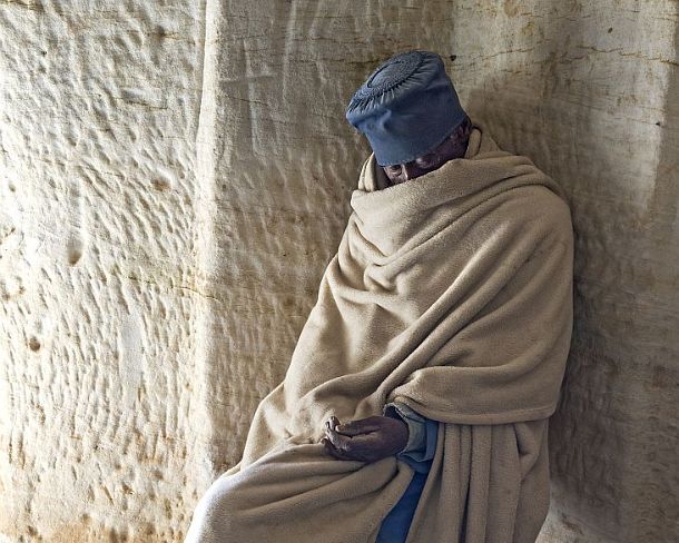 sm1gva_ET_x2083_g Orthodox Priest of rock-hewn church Daniel Korkor, Gheralta mountains, Tigray, Ethiopia