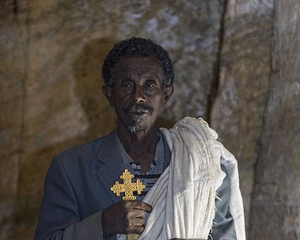 smgva_ET_x1609_g Coptic priest in the orthodox rock-hewn church Medhane Alem, Gheralta, Tigray, Ethiopia