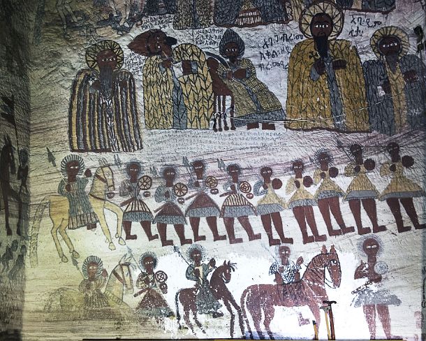 smgva_ET_x2338_g North wall of the church depicting: Upper register from left to right: the hermit Gebre Menfas who tamed wild beasts, middle: John, the Evangelists writing a...