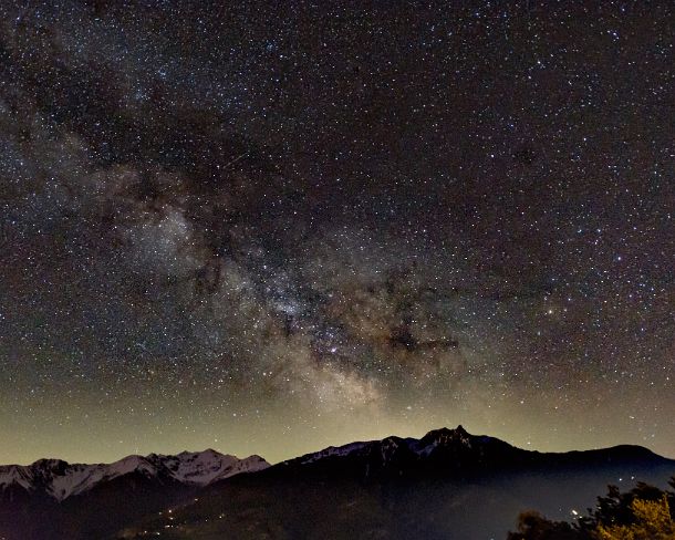 output2_milkyway Stars sky with Milkyway galaxy above the mountain panorama of the Lower Rhone Valley, Valais, Switzerland
